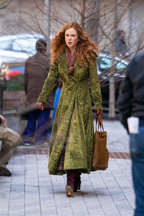 Nicole Kidman undoing coats